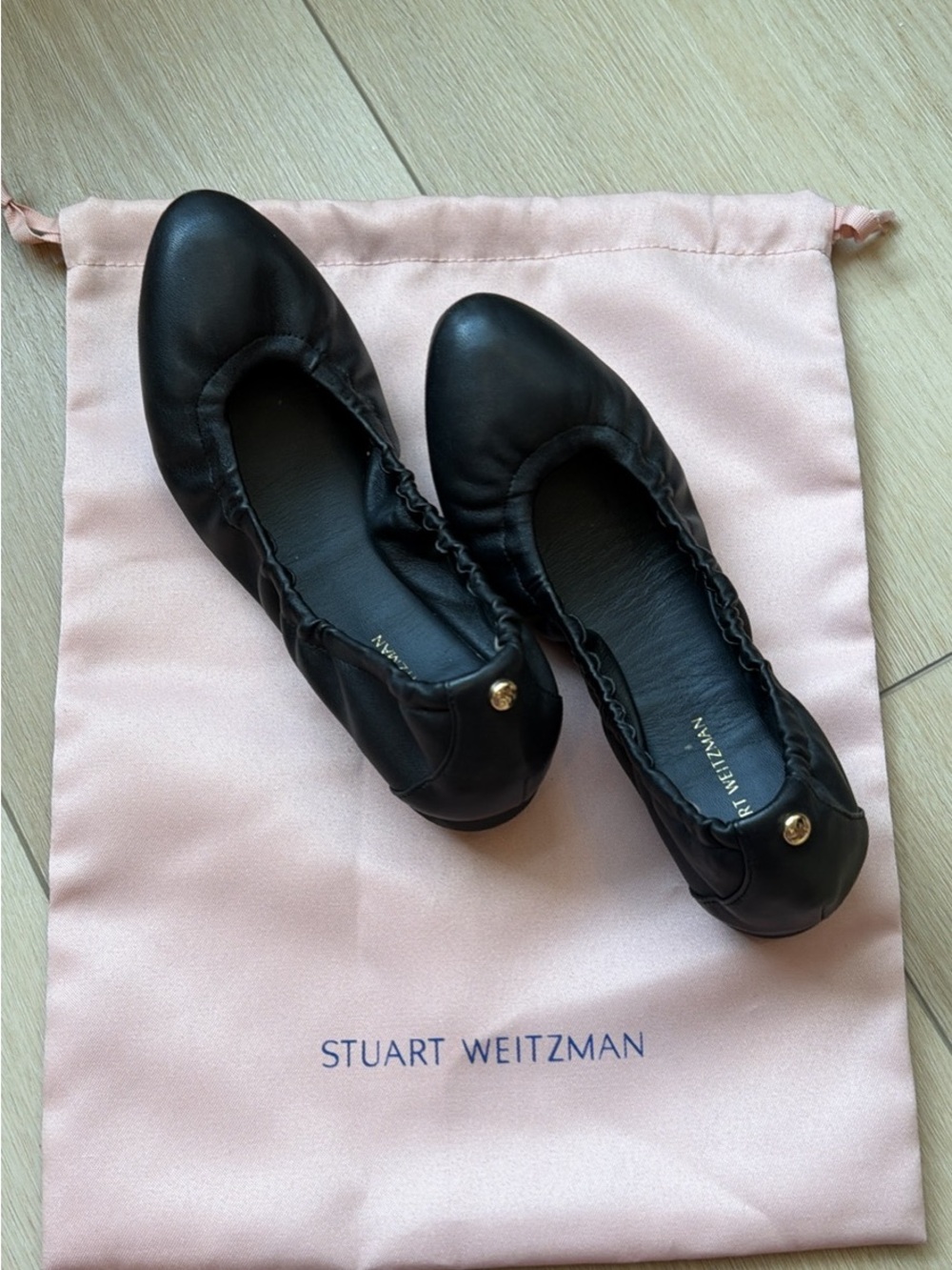 Stuart Weitzman Black Leather Ruched Ballet Flats with Gold Accent